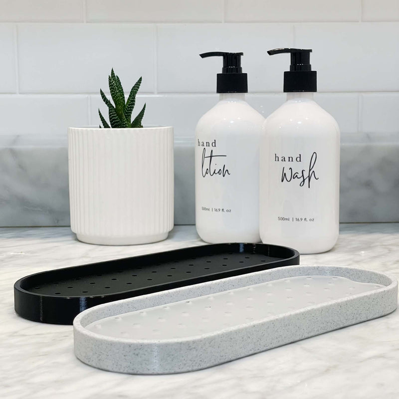 bathroom bottle tray sleek minimalist and elegant - marble design - pill-shape bottle tray - bottle tray for bathroom